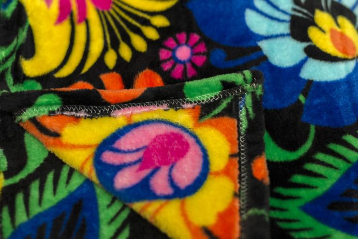 black blanket decorated with traditional flowers from lowicz's cutout