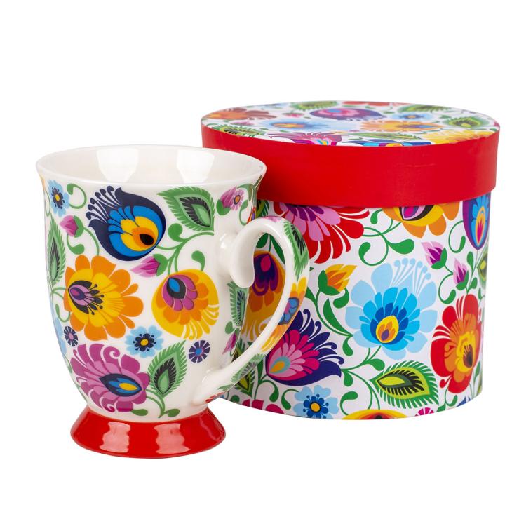 whote folk mug with lowicz flowers pattern and a box