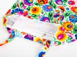 zipped pocket sewn into the inside of a white lowicz flowers cotton bag