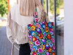 black lowicz flowers cotton bag on a model